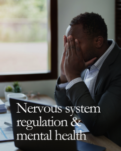 Person experiencing stress at a desk representing nervous system regulation and mental health challenges at Elevate Mind & Mood in Lincoln Nebraska