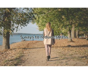 Woman walking along a lakeside path representing stress management techniques and healthy habits that support emotional wellbeing.