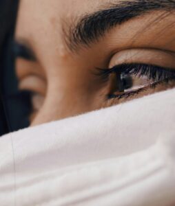 Person experiencing PTSD symptoms while exploring ketamine therapy for PTSD